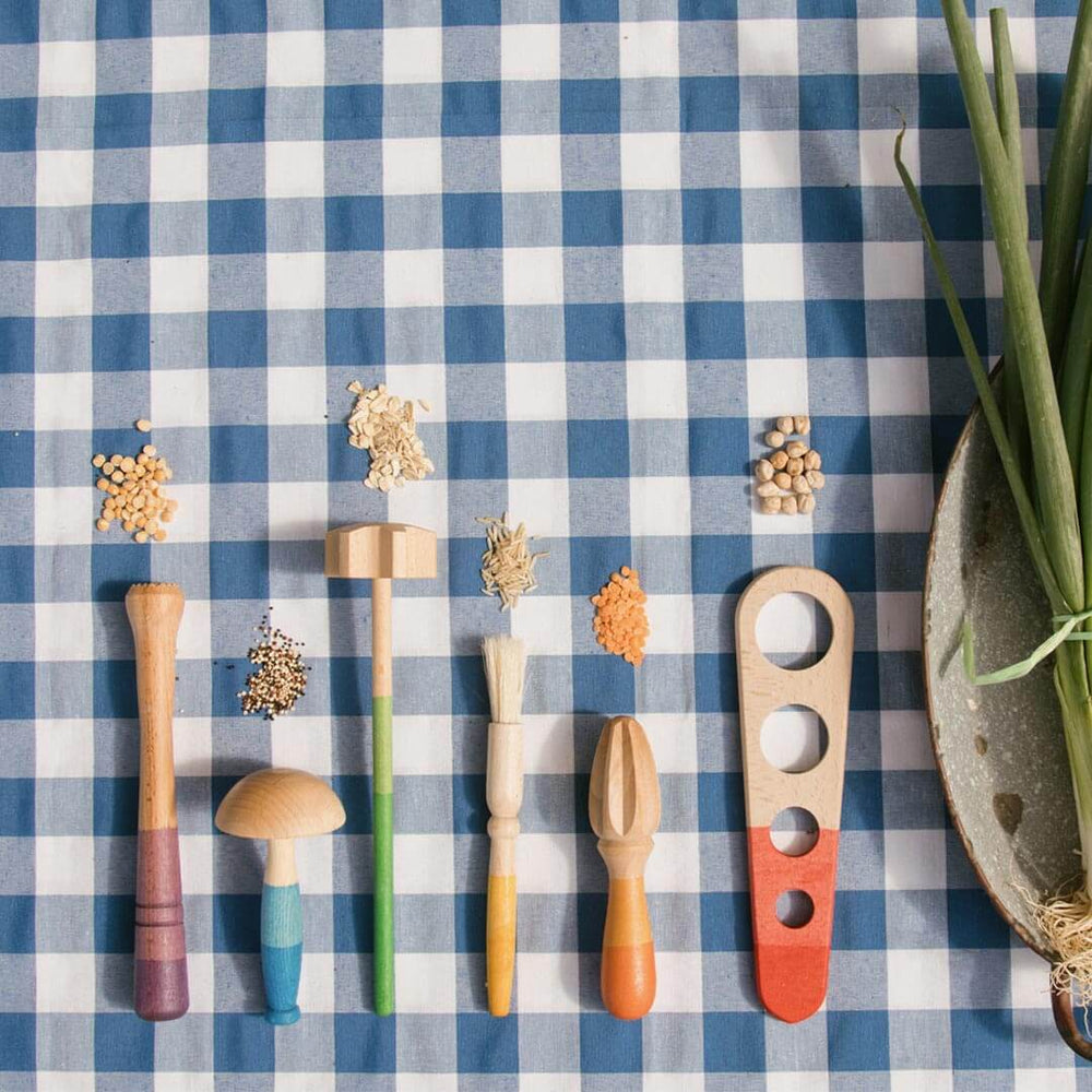 Grapat Tools collection with grain on a tablecloth