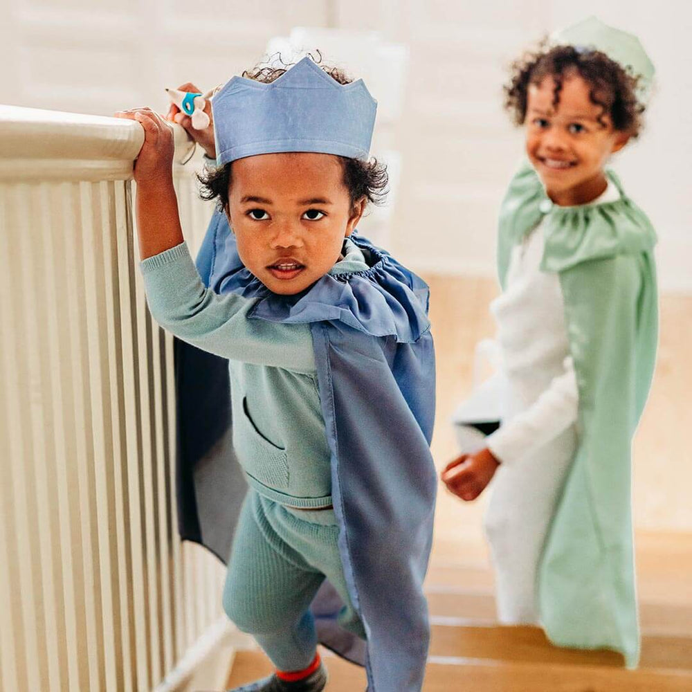 Child wearing Sarah's Silks Northern Coast Playsilk crown and cape