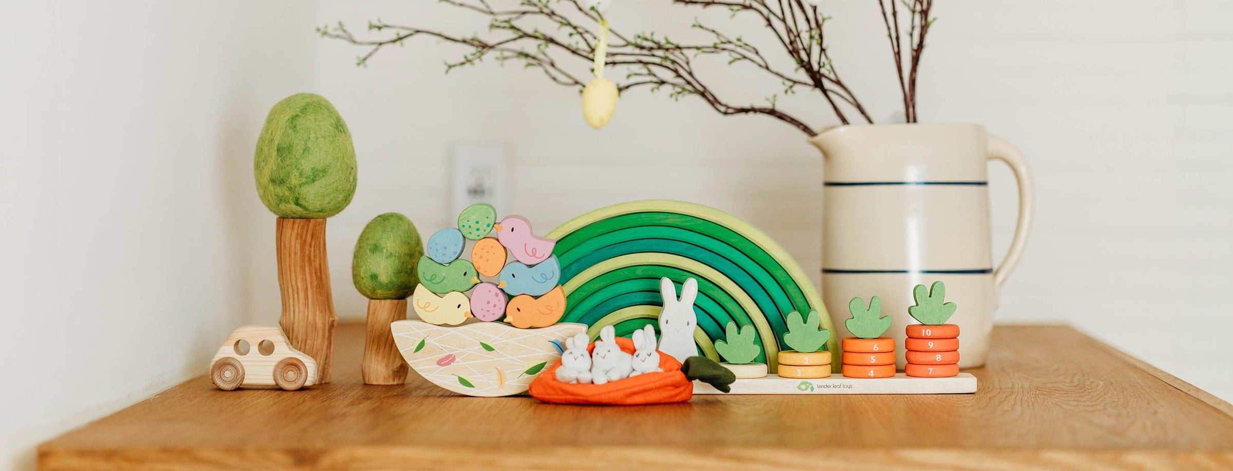 Assorted Tender Leaf Toys on wooden table